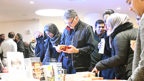 Browsing at the book stall during the reception
